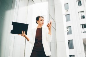 Young women outside on phone